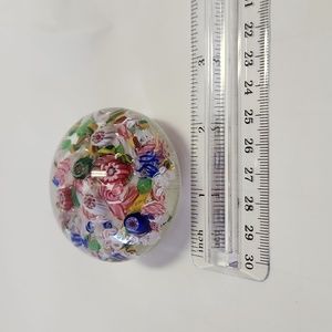 millifoiri glass paperweight.